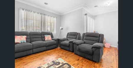 Charming Three-Bedroom Home with Low-Maintenance Appeal - Photo 2