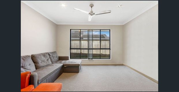 Modern 4-Bedroom Home in the Heart of Brassall - Photo 1