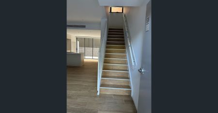 Near new, split level, spacious two bedroom, two bathroom apartment in quiet location only metres from Homebush Train Station - Photo 5