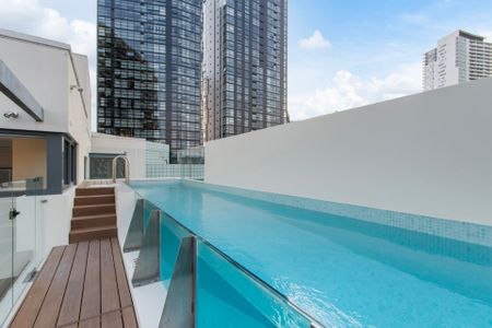 Split Level Penthouse Living&comma; Expansive Terrace & Private Lap Pool - Photo 3