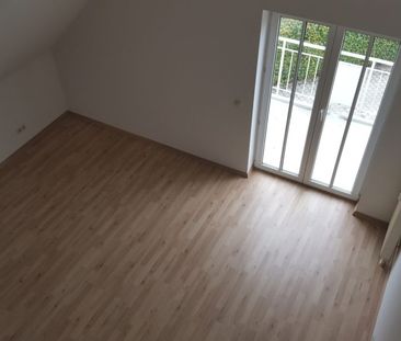 Ruhig gelegene Maisonette-Wohnung mit Balkon, Laminat und EBK im Da... - Photo 4