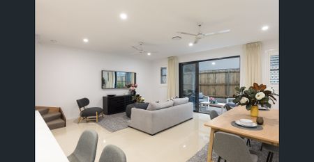 Spacious 4-Bedroom Townhome- Available Soon - Photo 3