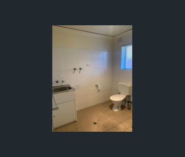 Upstairs two bedroom unit in great location! - Photo 5