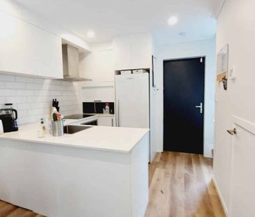 Stylish 2-Bedroom Home with Modern Comforts & Private Outdoor Spaces - Photo 4