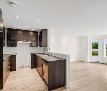 Condo 4 ½ à louer, avec 2 stationnements intérieurs chauffés, près ... - Photo 3