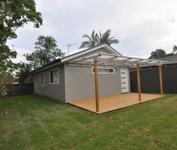 Modern Two-Bedroom Flat with Private Yard - Photo 2