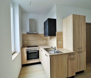 Appartement te huur in Florennes voor € 630 met 1 slaapkamer - Photo 1