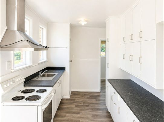 Freshly Renovated Family Home in a Peaceful Location - Photo 1