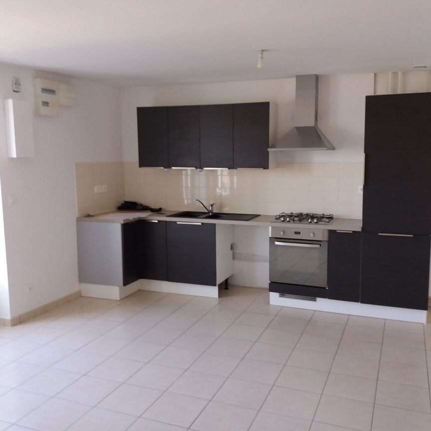 Location Maison 4 pièce(s) - 74 m² - Photo 1