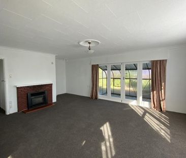 Spacious 4-Bedroom Home in Prime Location - Photo 2