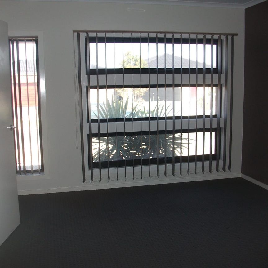 Great Value 4 Bedroom Home - Photo 1