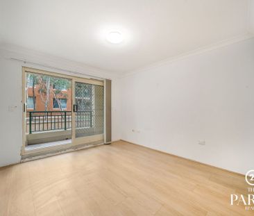 Spacious Apartment with Leafy Outlooks & Resort-Style Pool - Photo 1