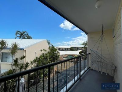 Centrally Located Furnished 2-Bedroom Unit with Pool Access - Photo 1