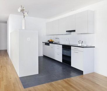 Moderne 4.5 Zimmer Attika Wohnung in familienfreundlicher Überbauung - Foto 3