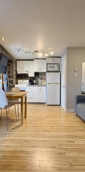 Loft entièrement meublé à louer Vieux-Québec juillet 2026 - Photo 1