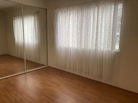 Spacious 2-Bedroom Unit with Balcony & Garage in a Quiet Street - Photo 2