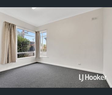 UPDATED 3 BR HOME WITH HUGE RUMPUS ROOM, & HEAT & COOL! - Photo 5