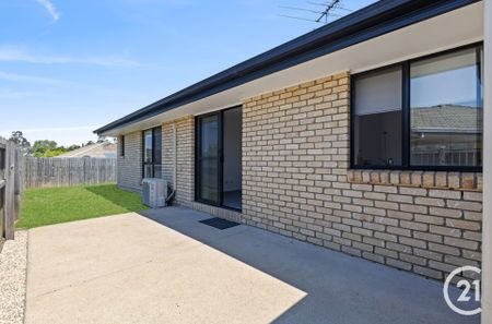 Stylish & Spacious Family Home in Prime Collingwood Park Location - Photo 4