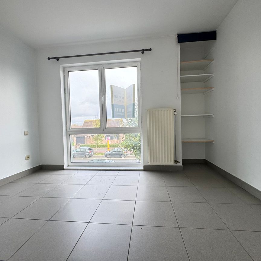 Energiezuinig en centraal gelegen 2-slaapkamerappartement met garage - Photo 1