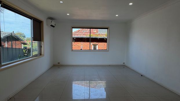 Spacious 4-Bedroom Home with Large Backyard & Separate External Cabin - Photo 1