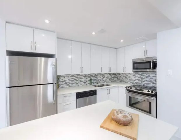 Village Green | 40 Alexander Street, Toronto - Photo 1