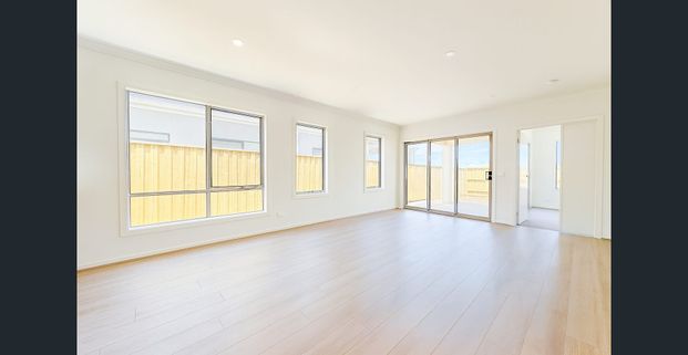 Brand New Family Living in a Prime Location - Photo 1