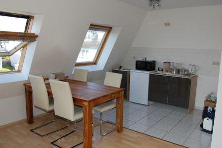 Moderne und helle 2-Zimmerwohnung mit Dachterrasse in schöner Wohnlage! - Foto 4