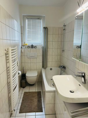 Gemütliche 2 Zimmer mit Einbauküche & Balkon in zentraler Lage - Photo 1