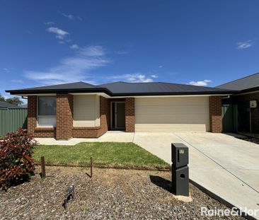 Four Bedroom Home in Evanston Gardens! - Photo 5