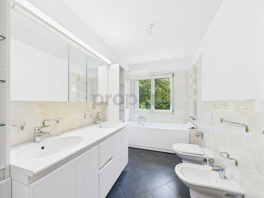 Luminoso appartamento da 4.5 locali con giardino a Morcote - Foto 1