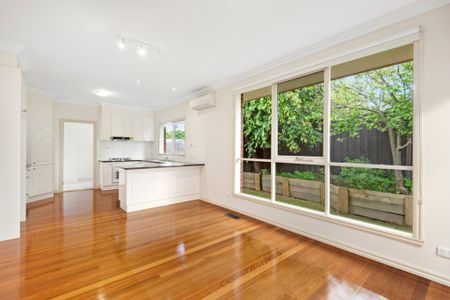 Quiet, Convenient, and Spacious 3-Bedroom Unit - Photo 2