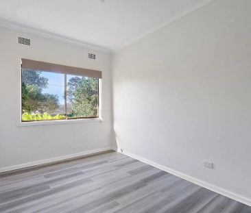 Introducing this charming family home. - Photo 1