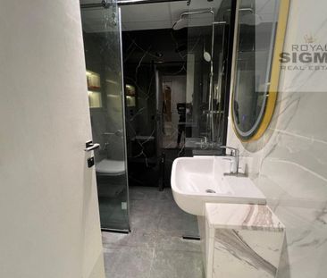 Modern 1BR Apartment in Barsha Heights - Photo 1