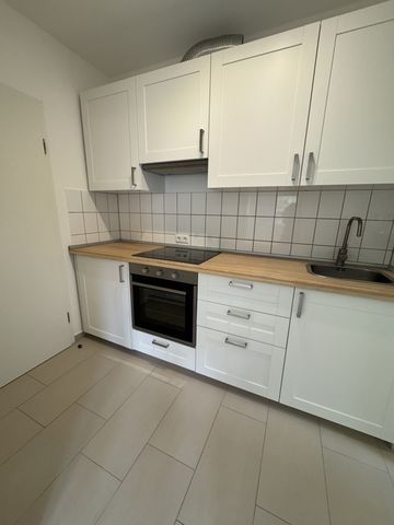 Modernisierte 1-Zimmerwohnung mit Einbau ... - Foto 5