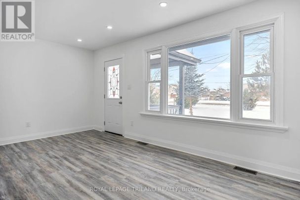 1223 SUNNINGDALE ROAD E - Photo 1
