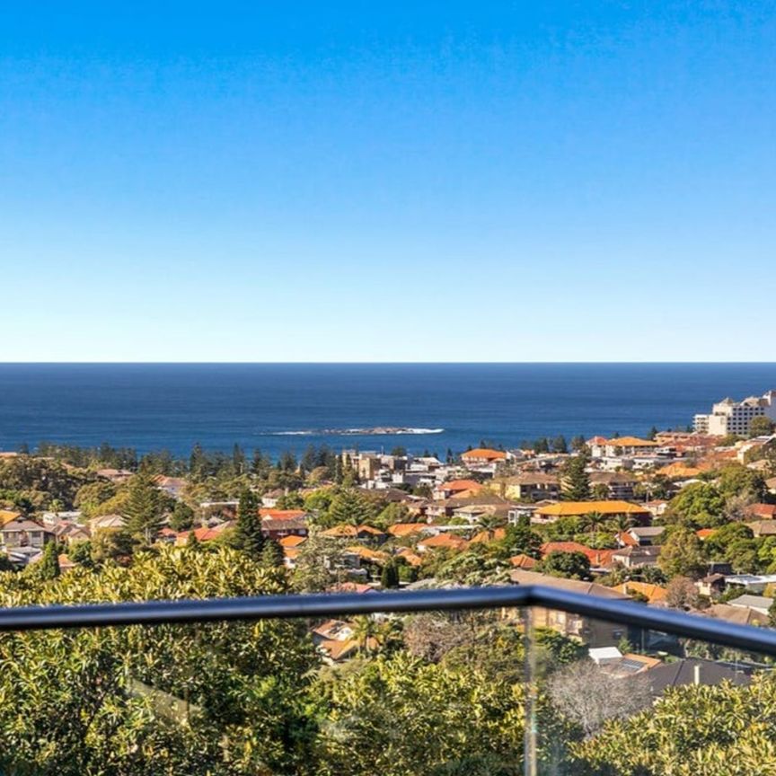 Beautiful Ocean Views on Top Floor of Security Building in Fantastic Location - Photo 1