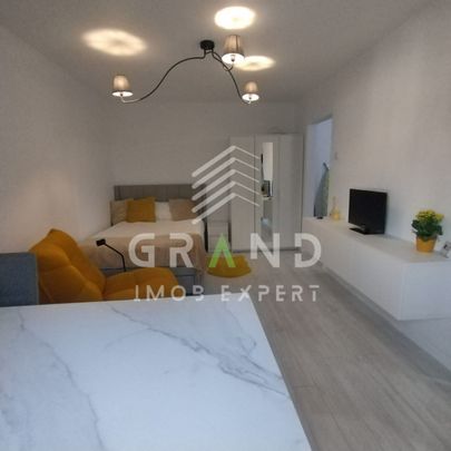 Garsonieră de inchiriat - intimă și bine compartimentată - Fotografie 1