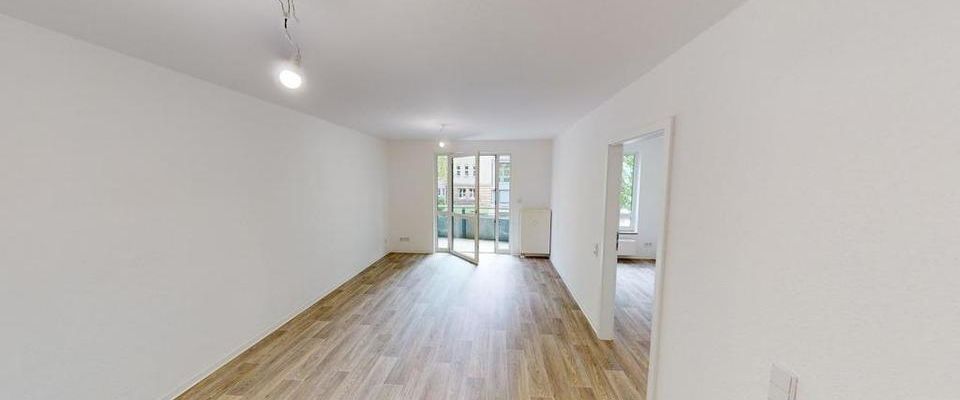 Geräumige 2-Raum-Wohnung mit Balkon - Foto 1