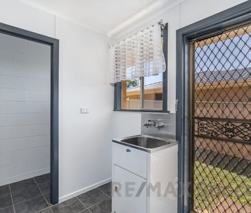 Comfortable & Easy-Care Unit in Handy Wilsonton Location - Photo 4