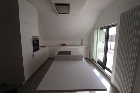 Modern en energiezuinig 2-slaapkamerappartement met carport en ruim terras. - Foto 3