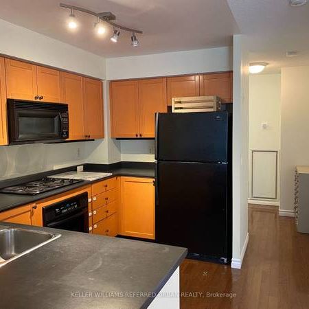 Very spacious modern feel + den parking included! - Photo 3