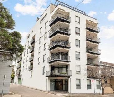 Bright & Modern Apartment with City Views + Parking - Photo 6