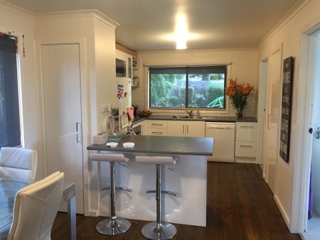 Convenient & Comfortable Living – Walk to the Train Station! - Photo 2