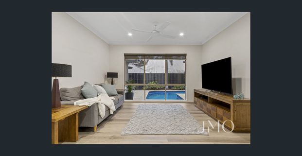 Beautiful 5 Bedroom Home with 3 Living Areas and Pool - Photo 1