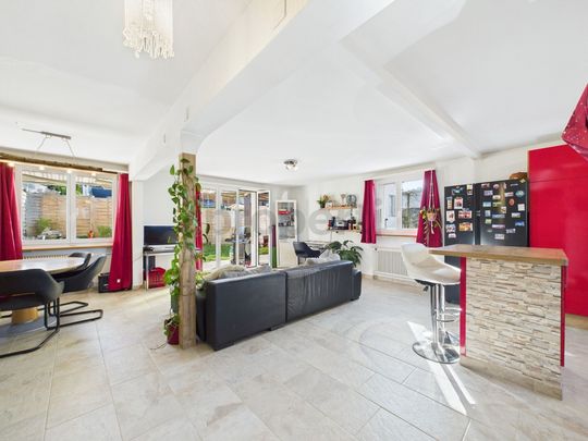 Modern 4.5-room terraced house with garden in Büsserach - Photo 1