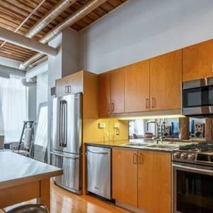 OVERSIZED ONE BDRM WITH HIGH CEILINGS IN THE CANDY FACTORY LOFTS! - Photo 2