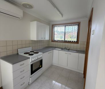 Neat Two Bedroom Unit - Photo 3