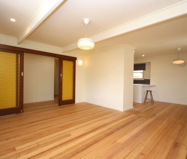 Superbly located and fully renovated home in Belmont. - Photo 1