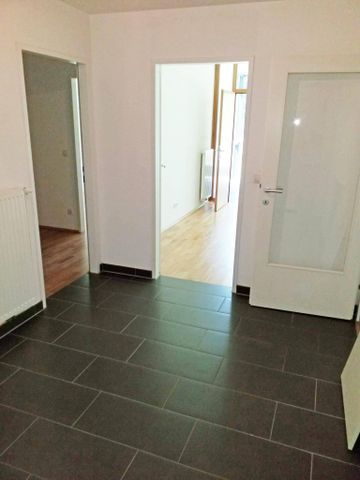 Gemütlich 2-Zimmerwohnung mit Wintergarten und Blick ins Grüne - Photo 3