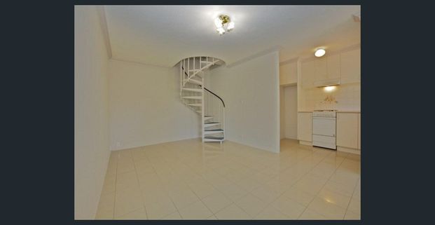 Beautiful Two-Bedroom Unit in Serene Surroundings - Photo 1